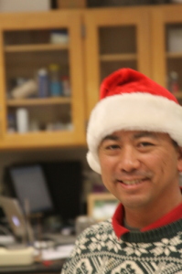 Mr. Tena added the classic Santa hat along with the sweater.