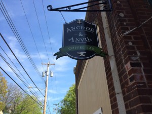 The Anchor & Anvil Coffee Bar sign now hangs in place of The Fire Escape's.