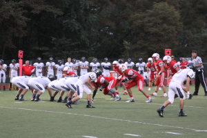 The Avonworth Antelopes' defense lines up against Brentwood's offense in the first quarter of Friday night's game. Photo By Ethan Woodfill