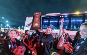 After making the bus ride back to Pittsburgh, the girls took pride in their well-earned victory. Outside hitter Clementine Dutot-Lucs held their new trophy up high.